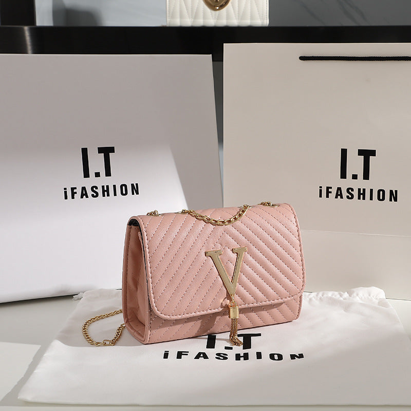 Trendy women's bag 2024 new fashion striped embroidered shoulder bag V-shaped tassel decoration messenger bag