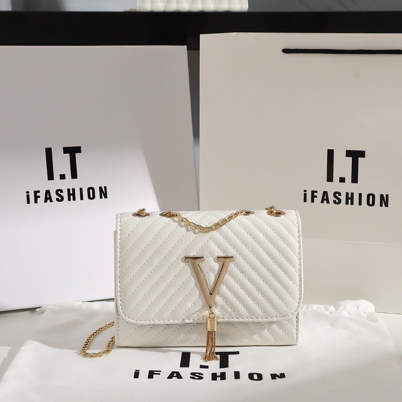 Trendy women's bag 2024 new fashion striped embroidered shoulder bag V-shaped tassel decoration messenger bag